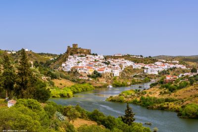 View up Rio Guardiana to Mertola with castle on the hill