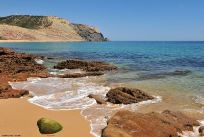 View of Praia da Luz beach and Black Rock from west rocks