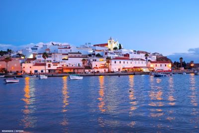 Ferragudo at dusk from across the river