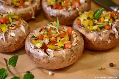 Mushrooms stuffed with chopped vegetables